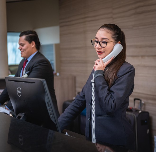 Receptionist at front desk
